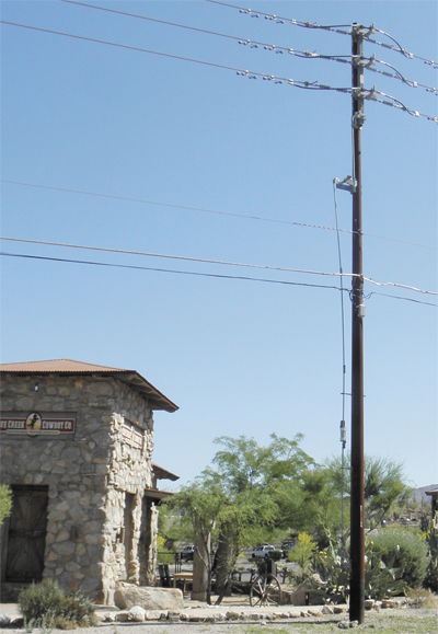 metal utility poles along cave creek road